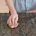 How do you disinfect granite without damaging it?